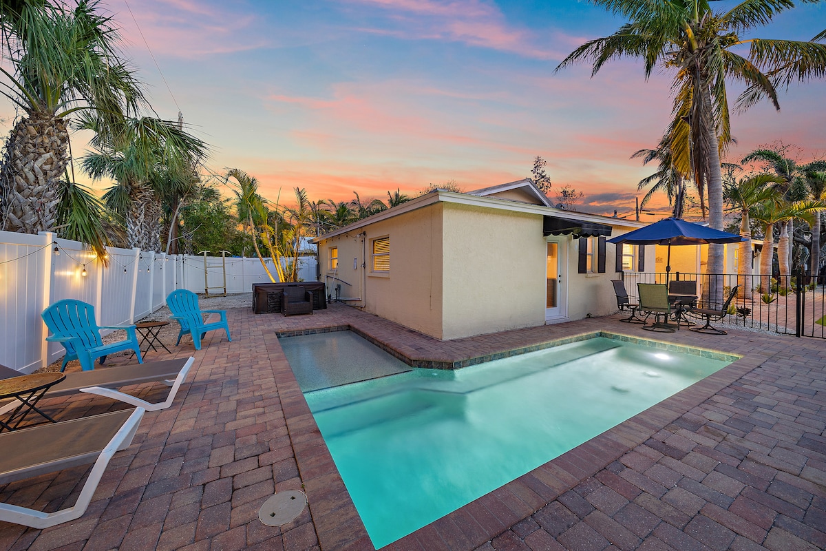 Heated pool at the cottages at sunset